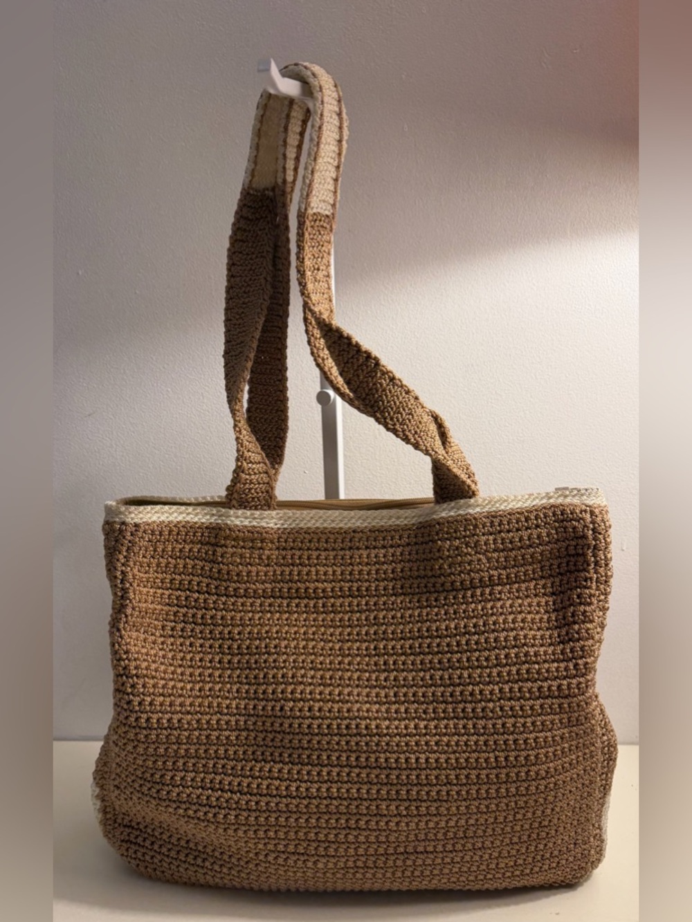 The Sak crocheted beige and cream tote.